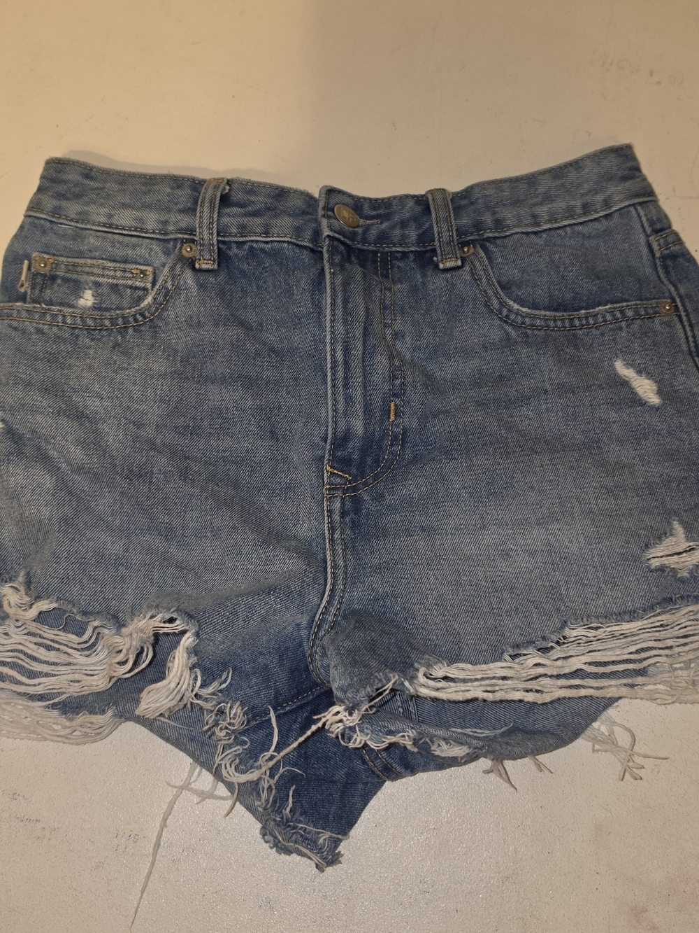 Lovers + Friends blue denim shorts with distressed frayed hem #distressed #denim